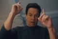 The Family Plan diaper changing scene: Mark Wahlberg as Dan Morgan in The Family Plan
