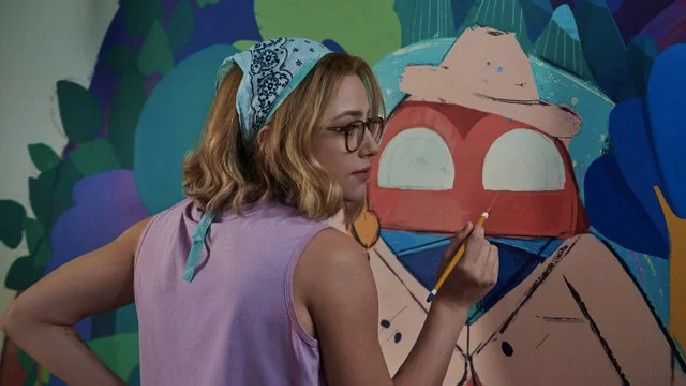 Look Both Ways lili reinhart as natalie painting at a wall