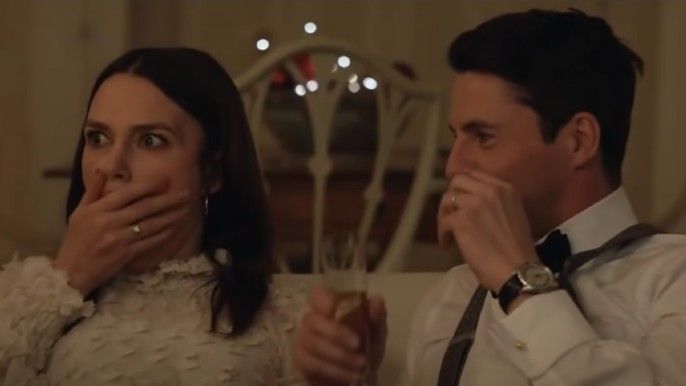 Keira Knightley as Nell, Matthew Goode as Simon gasp in shock in Silent Night