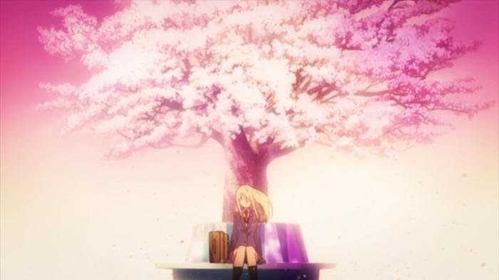 Mashiro sitting under a tree.