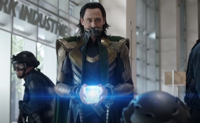 Loki runs away with the Tesseract in hand
