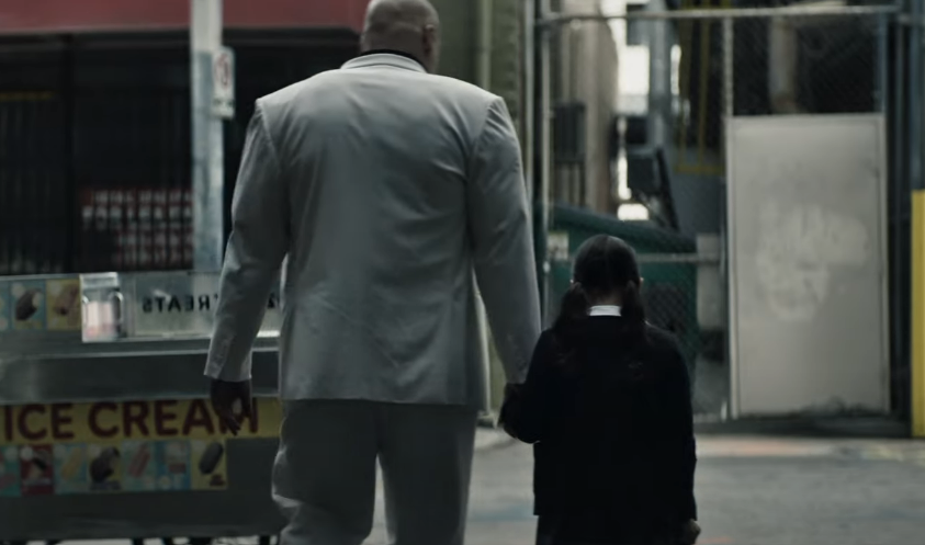 Kingpin and a young Maya walking in the streets together