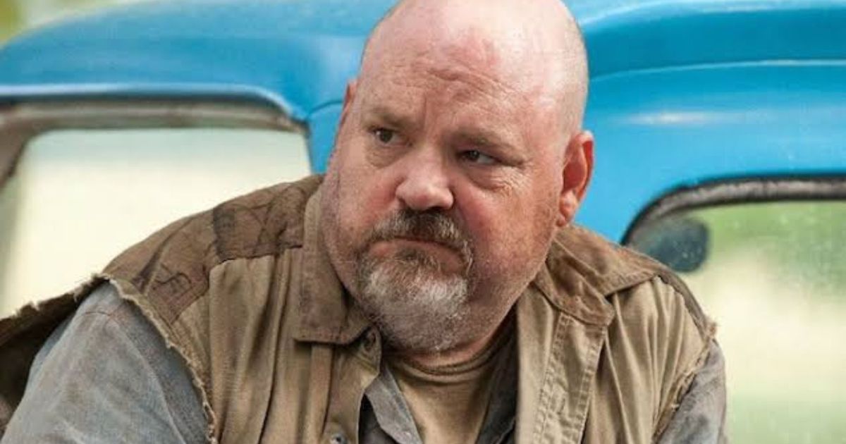 Image showing Pruitt Taylor Vince standing on front of a truck