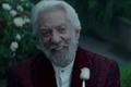 why does president snow wear roses: Donald Sutherland as President Coriolanus Snow
