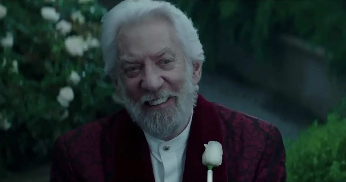why does president snow wear roses: Donald Sutherland as President Coriolanus Snow