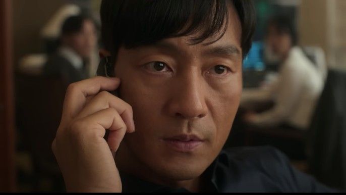 Park Hae Soo as Choi Chang Ho on a phone call in Narco-Saints