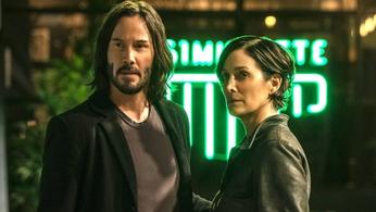 Keanu Reeves and Carrie Anne Moss
