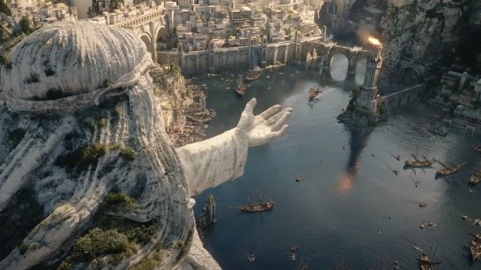 lord of the rings: rings of power statue stretching arm out towards bridge