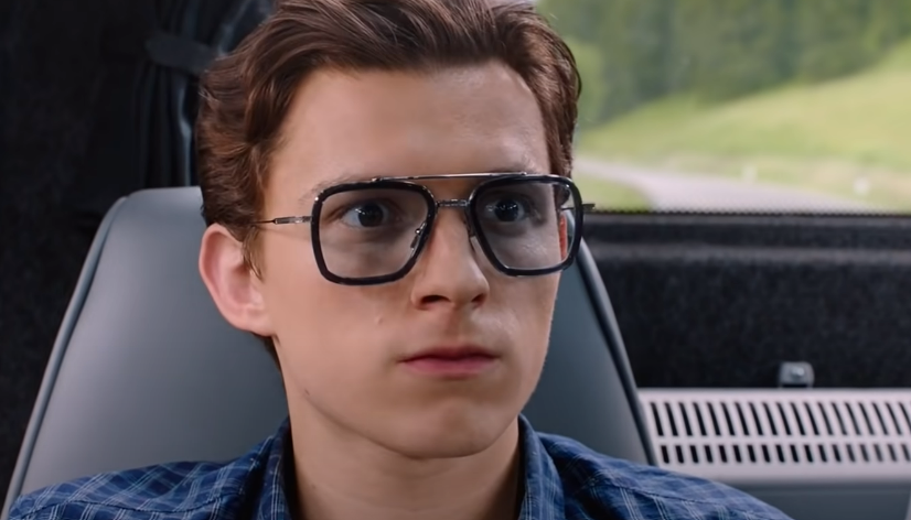 Tony Stark hands over his EDITH glasses to Peter Parker