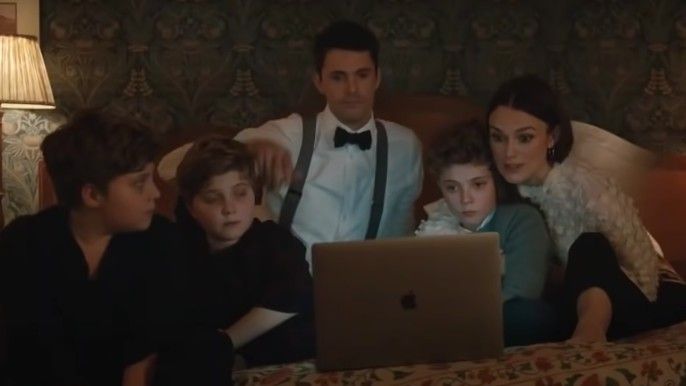 Keira Knightley as Nell, Matthew Goode as Simon with kids in Silent Night 