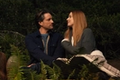 Virgin River Martin Henderson as Jack Sheridan and Alexandra Breckenridge as Melinda Monroe sitting in the woods