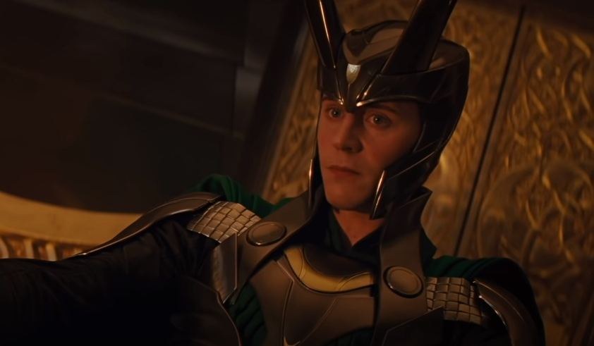 Loki sits on Odin's throne in Asgard