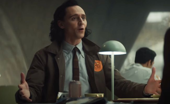 loki season 1 tom hiddleston as loki wearing brown Time Variance Authority uniform
