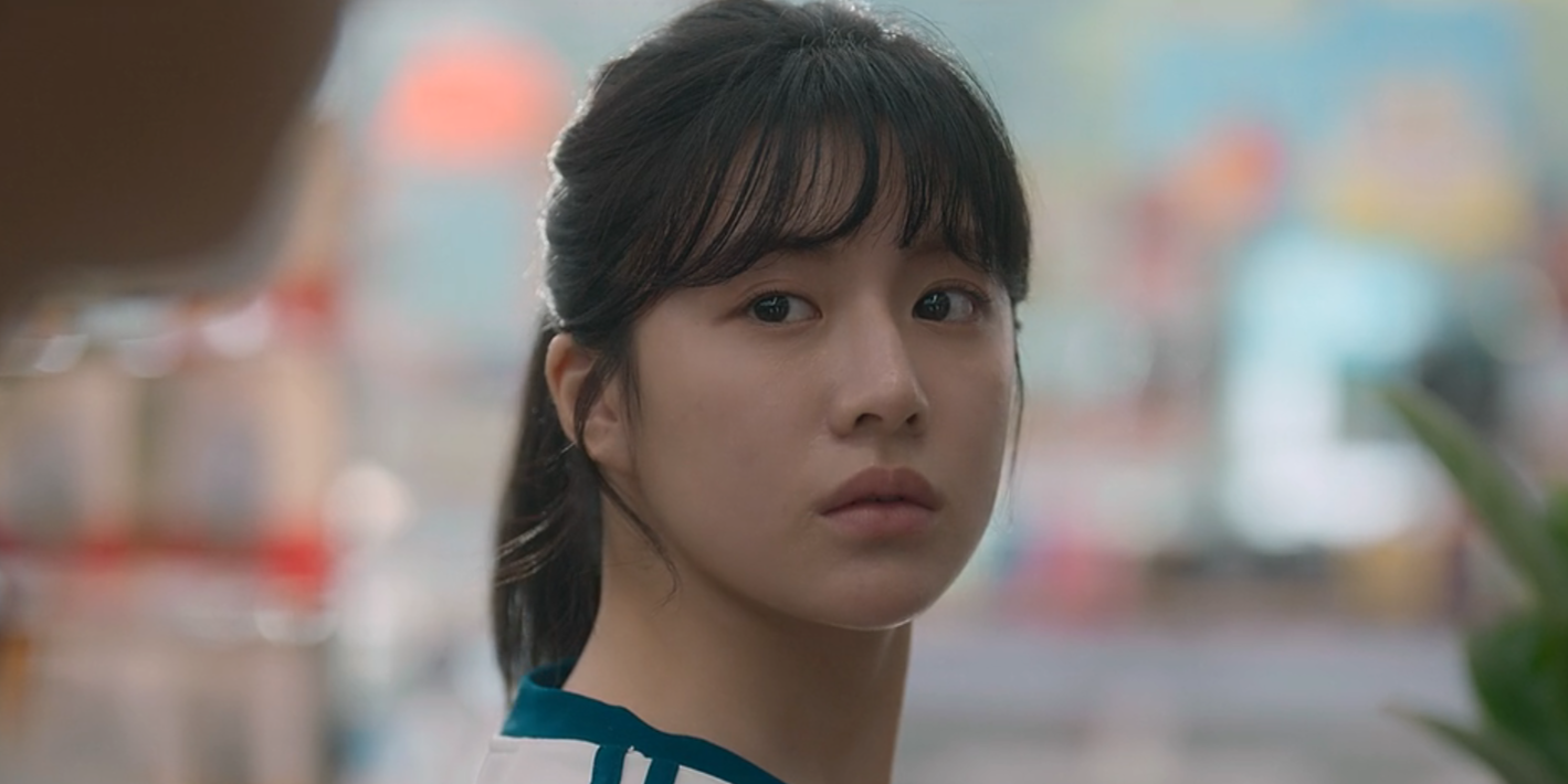 Hui-soo looking at someone
