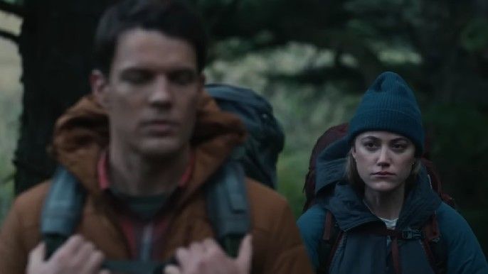Jake Lacy as Harry hiking with Maika Monroe as Ruth in Significant Other