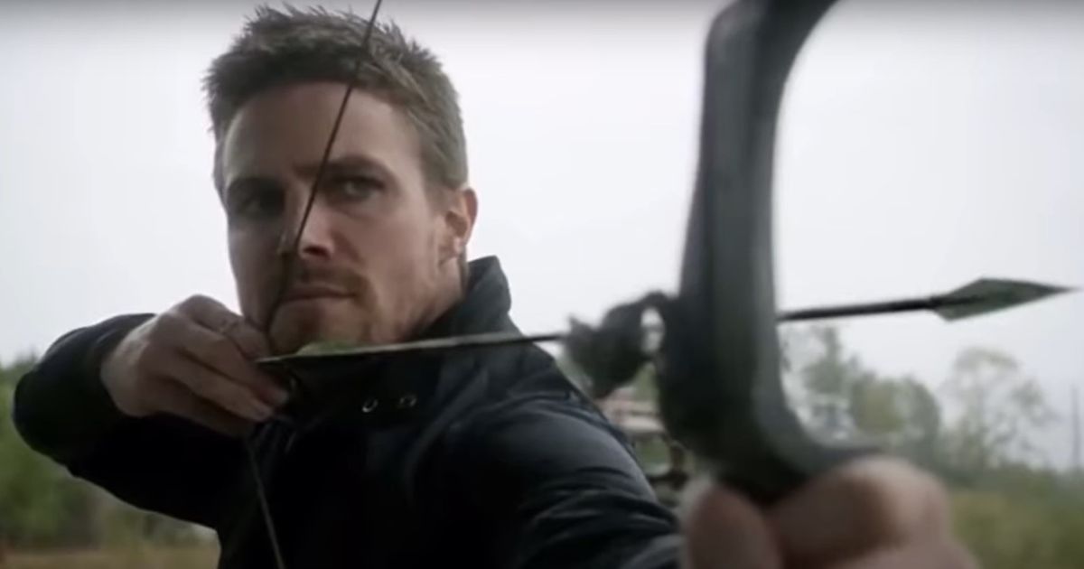Oliver Queen using his bow and arrow