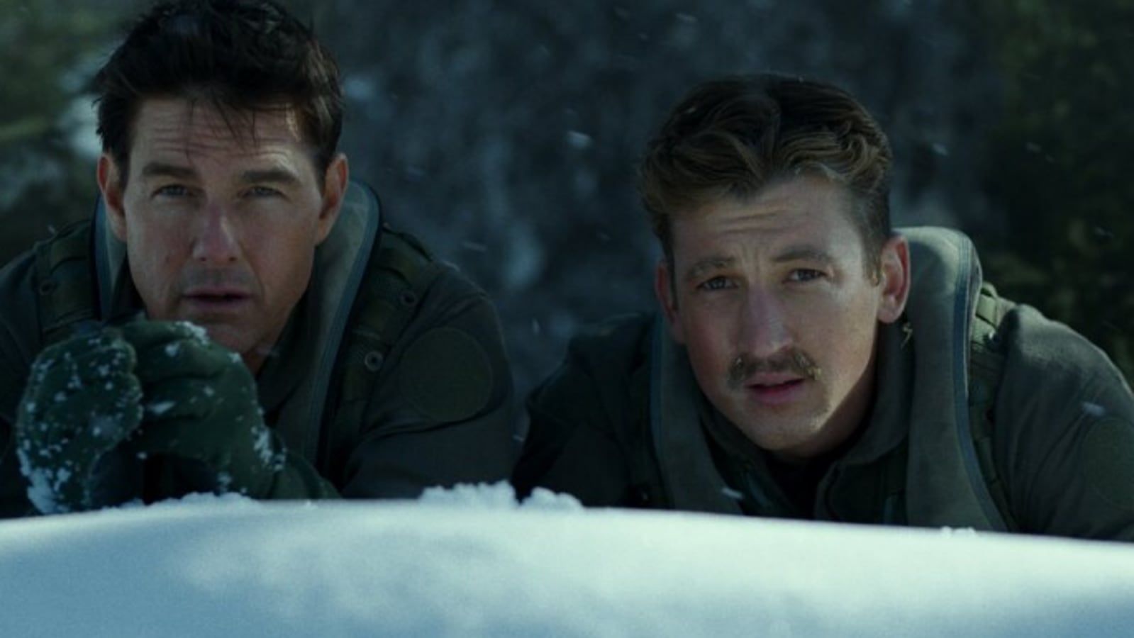 Tom Cruise as Maverick and Miles Teller as Bradley Bradshaw in Top Gun: Maverick